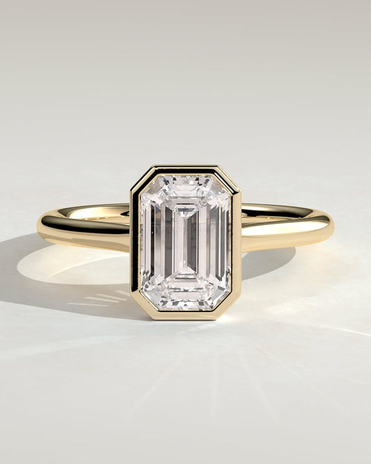 Emerald Cut Bezel Sidestone Ring