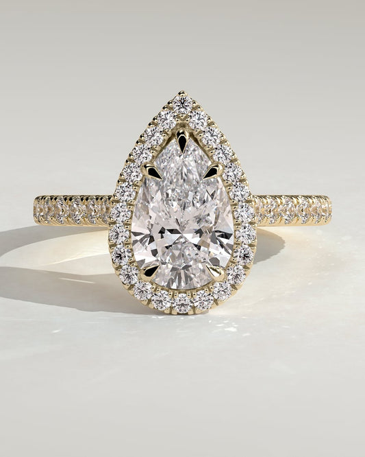 Exquisite Pear Cut Halo Pave Ring