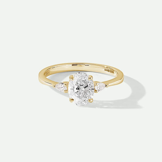 Rebecca Three-Stone Sidestone Ring